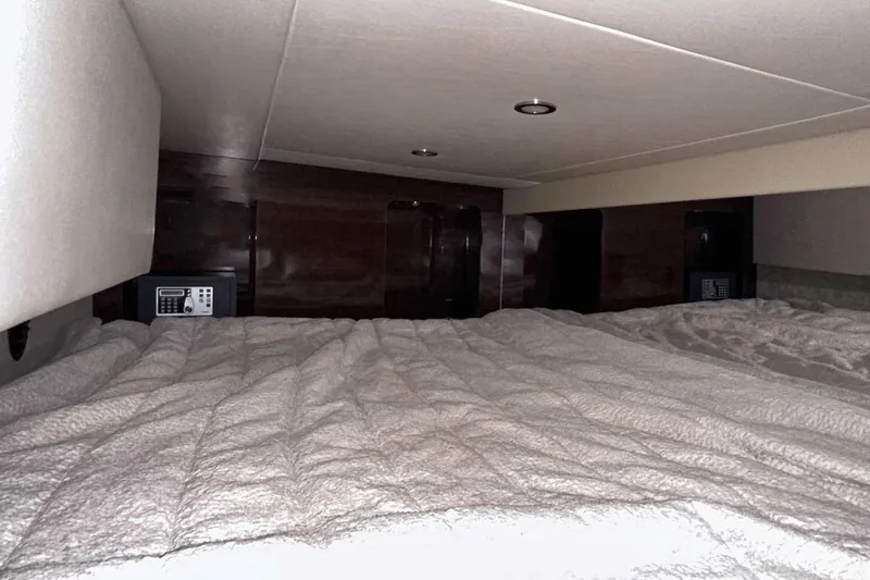 Slide: The Image of 2022 Formula 350 Sun Sport cabin interior with bed and safes. - 44