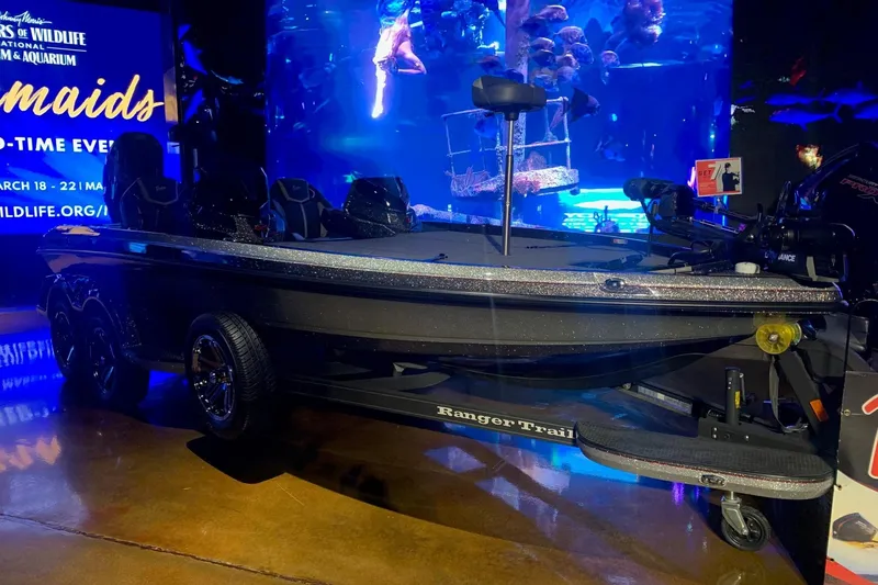 The Image of 2024 Ranger Z520R Cup-Equipped boat displayed indoors with aquarium backdrop. - 0