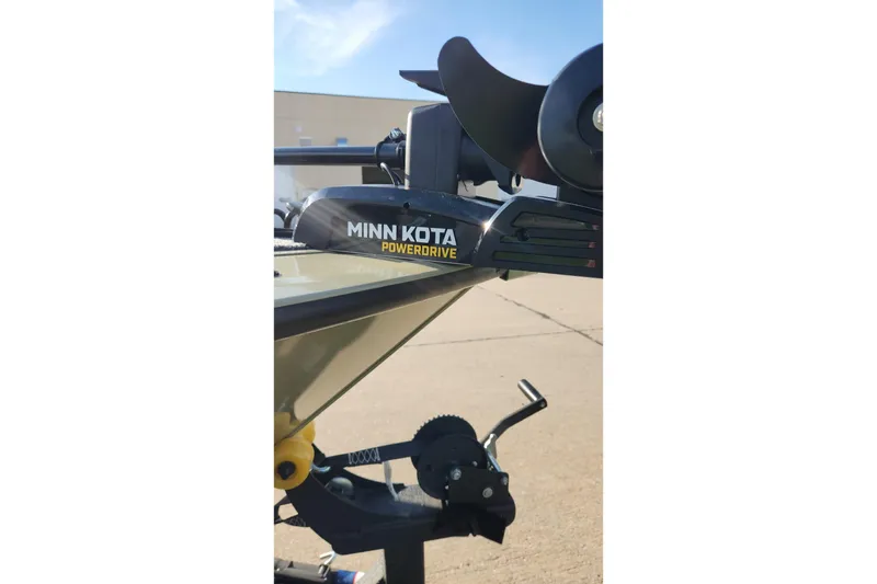 Slide: The Image of 2026 Tracker Targa V-19 Combo boat rear view with motor on trailer. - 4