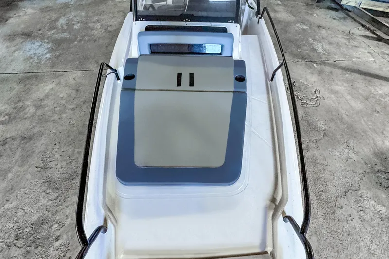 Slide: The Image of 2023 Axopar 25 Cross Top boat deck with sleek design and modern features. - 12