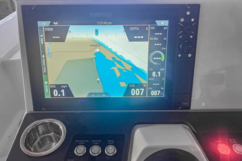 Slide: The Image of Simrad navigation display on 2023 Axopar 25 Cross Top boat dashboard. - 6