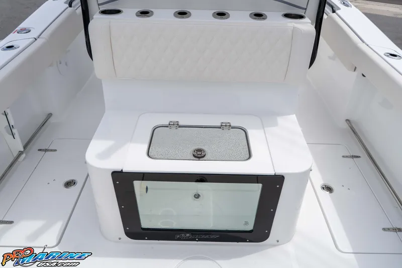 Slide: The Image of 2026 Sea Hunt Gamefish 27 Coffin Box interior with seating and storage features. - 12