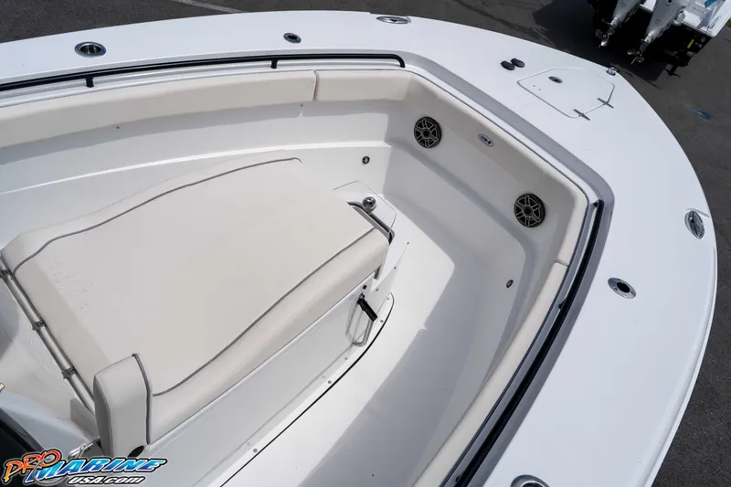 Slide: The Image of 2026 Sea Hunt Gamefish 27 Coffin Box boat interior with seating and speakers. - 20