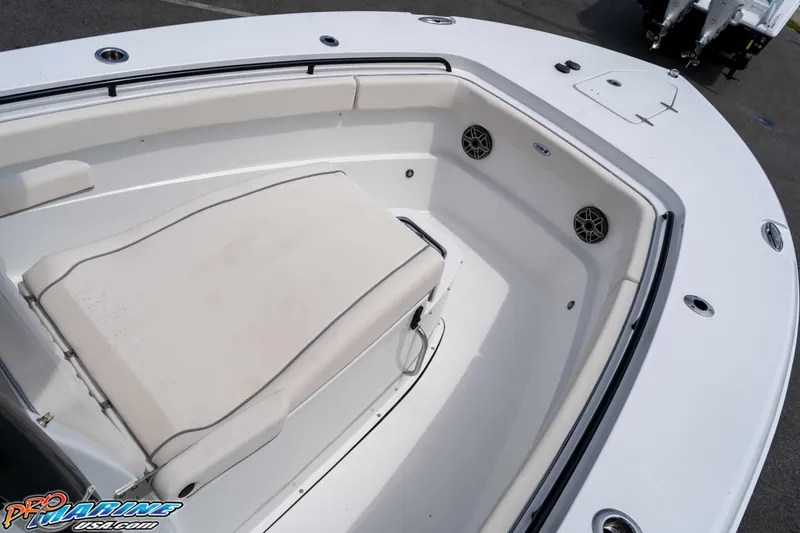 Slide: The Image of 2026 Sea Hunt Gamefish 27 Coffin Box boat interior with seating and speakers. - 21