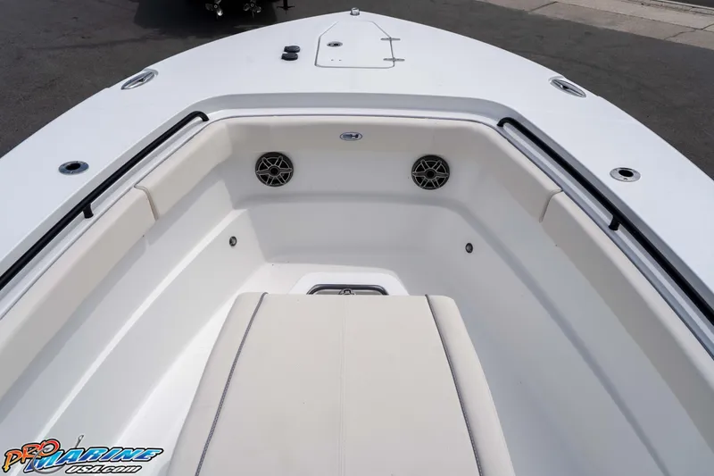 Slide: The Image of 2026 Sea Hunt Gamefish 27 Coffin Box boat interior with seating and speakers. - 22