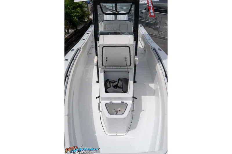 Slide: The Image of 2026 Sea Hunt Gamefish 27 Coffin Box boat interior with open storage compartments. - 25