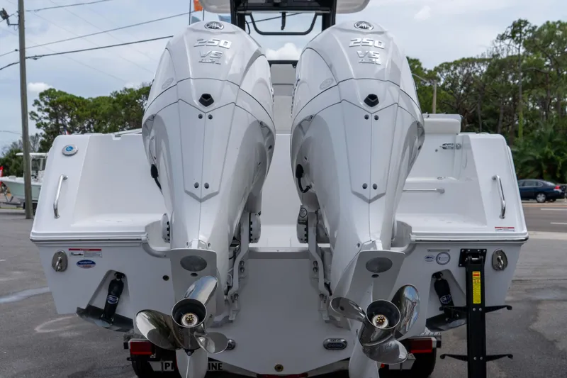 Slide: The Image of 2026 Sea Hunt Gamefish 27 Coffin Box with dual 250 V8 engines, rear view. - 4