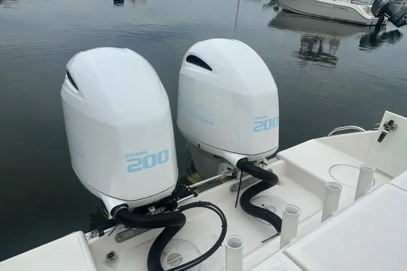Slide: The Image of Twin Yamaha 200 engines on 2020 Key West Billistic 261 Center Console boat. - 14