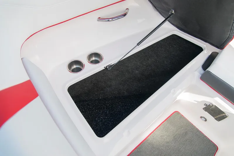 Slide: The Image of 2022 Regal 23 OBX boat with Yamaha 250 engine on a calm lake. - 6