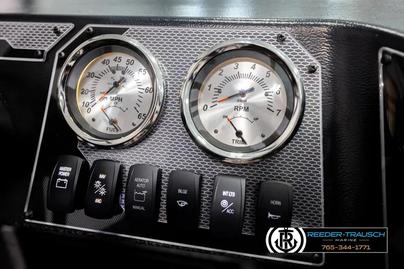 Slide: The Image of Dashboard of 2026 Lund 1800 Explorer Sport with speedometer and RPM gauges. - 31