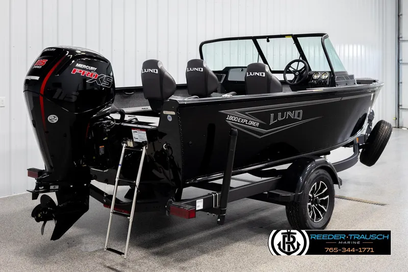 Slide: The Image of 2026 Lund 1800 Explorer Sport boat with Mercury Pro XS engine in showroom. - 4