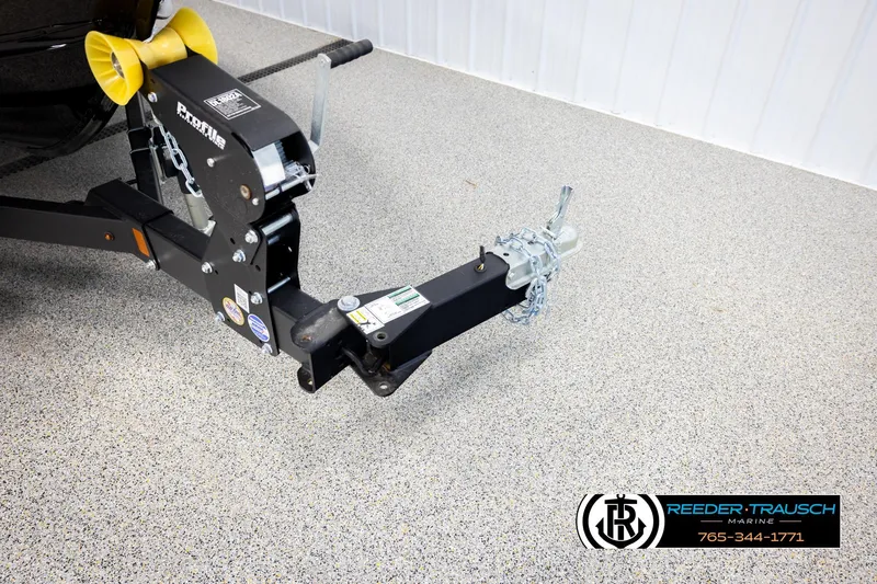 Slide: The Image of Trailer hitch of 2026 Lund 1800 Explorer Sport on speckled floor. - 43