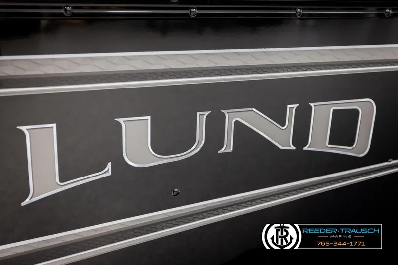 Slide: The Image of 2026 Lund 1800 Explorer Sport boat logo with Reeder-Trausch Marine branding. - 46