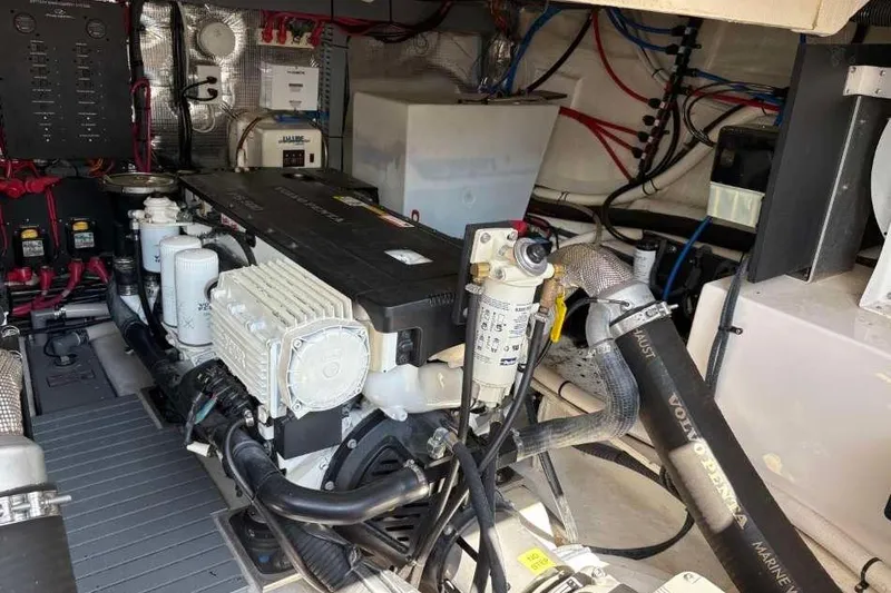 Slide: The Image of Engine room of 2019 Regal 42 Fly yacht with Volvo Penta components and wiring. - 26