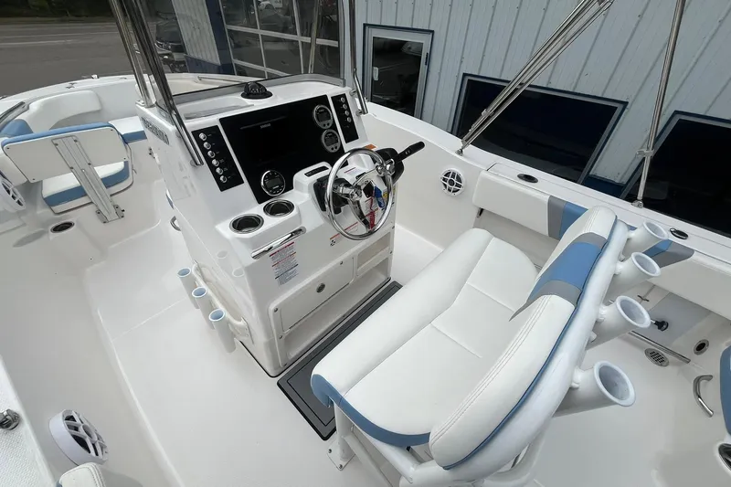 Slide: The Image of 2023 Robalo R200 Center Console boat interior with modern helm and seating. - 26