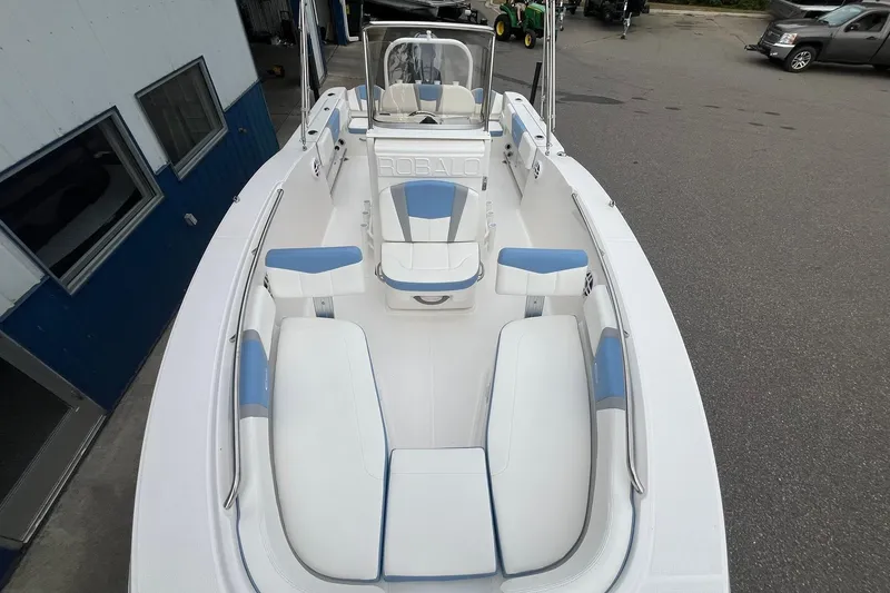 Slide: The Image of 2023 Robalo R200 Center Console boat with spacious seating and sleek design. - 32