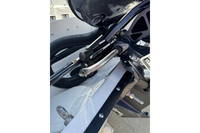 Slide: The Image of Close-up of 2026 Edgewater 170CC boat engine components and wiring. - 11