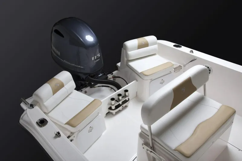 Slide: The Image of 2026 Edgewater 170CC boat dashboard with steering wheel, controls, and electronic displays. - 5
