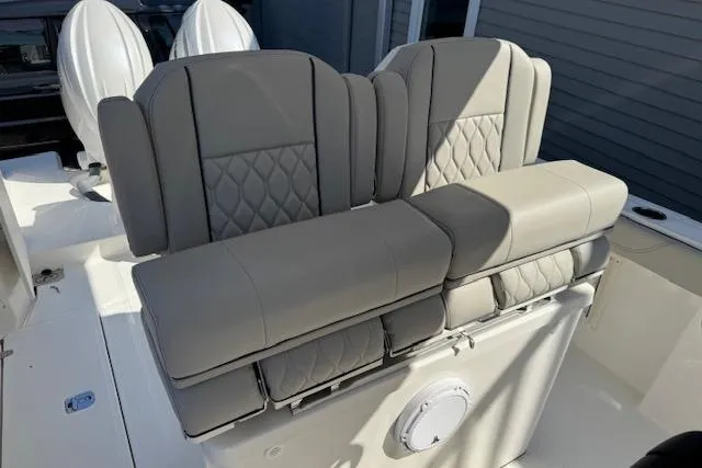 Slide: The Image of 2026 Pursuit S 268 Sport boat seats with quilted upholstery and modern design. - 4