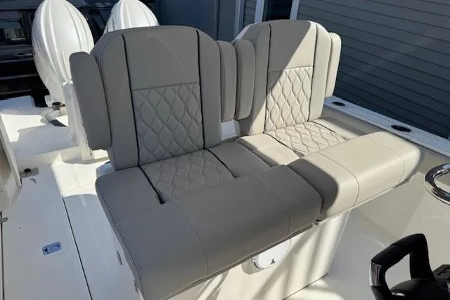 Slide: The Image of 2026 Pursuit S 268 Sport boat seats with quilted upholstery design. - 5