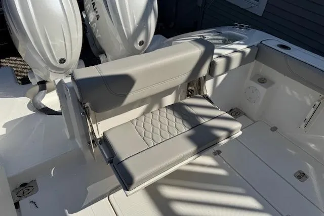 Slide: The Image of 2026 Pursuit S 268 Sport boat with foldable seating and dual Yamaha engines. - 6