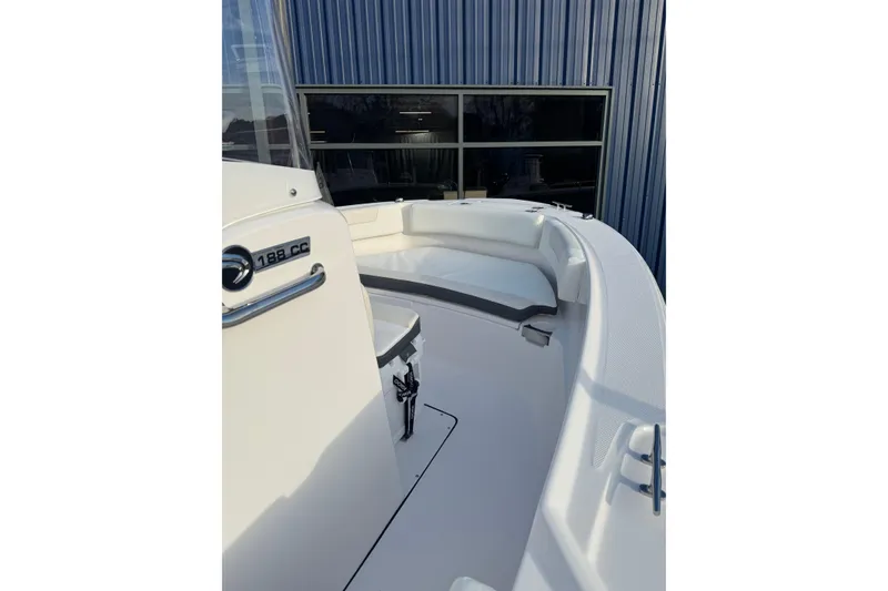 Slide: The Image of 2026 Edgewater 188CC boat interior with white seating and sleek design. - 16