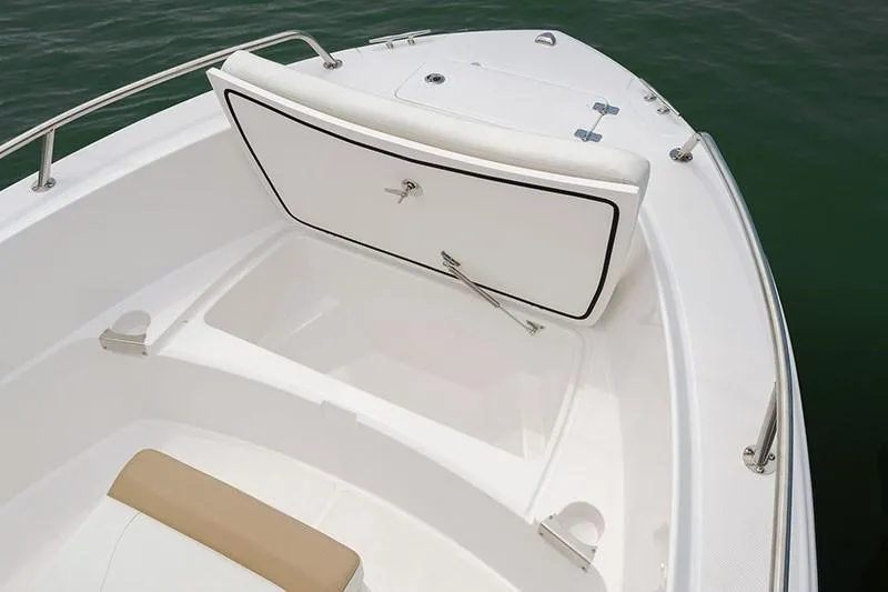 Slide: The Image of 2026 Edgewater 188CC boat on trailer, parked outdoors, front view. - 2