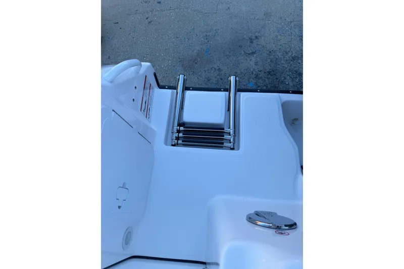 Slide: The Image of 2026 Edgewater 208CC boat swim platform with stainless steel ladder. - 14