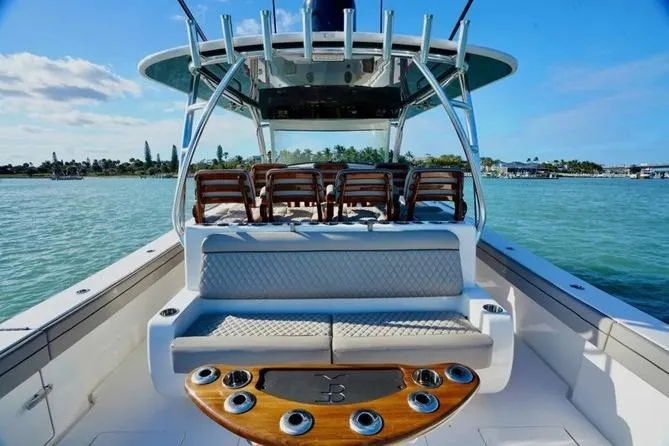 Slide: The Image of 2021 Valhalla Boatworks V-46 with seating and rod holders on a sunny day. - 7