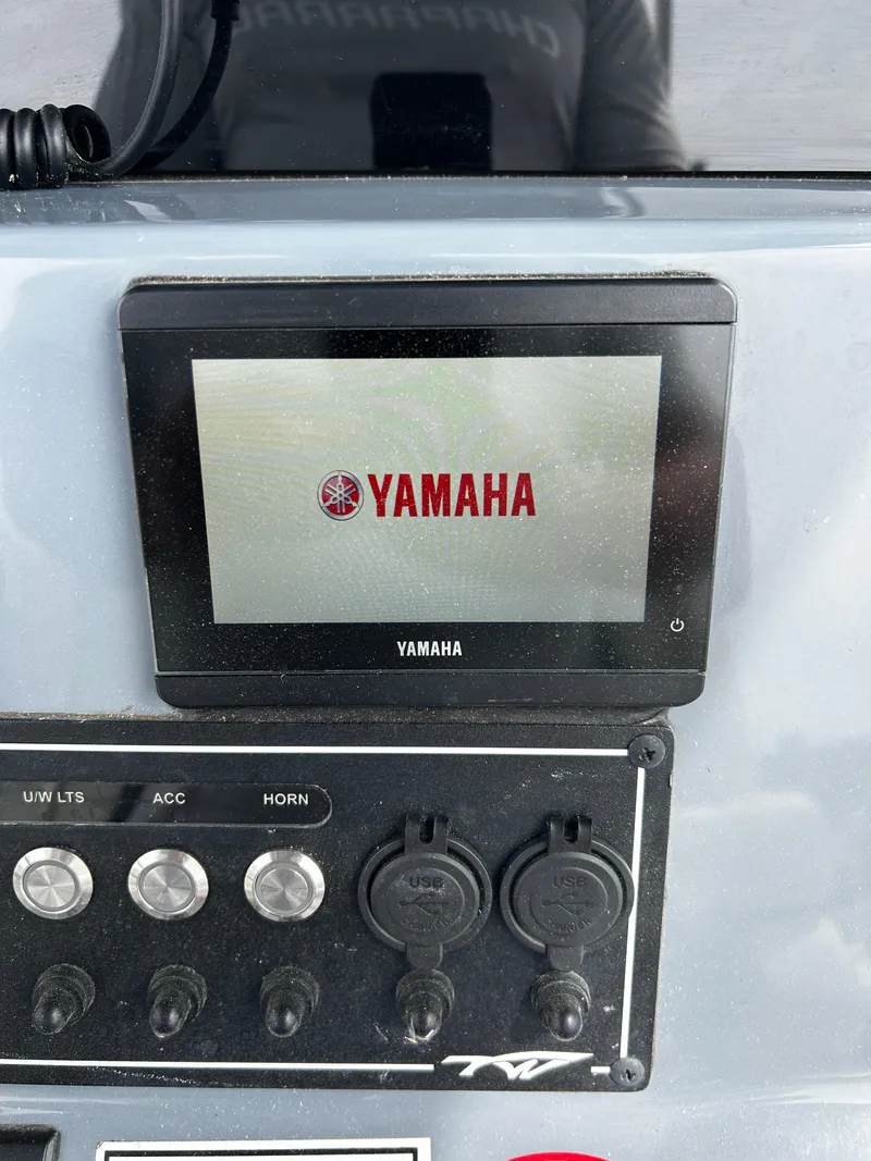 Slide: The Image of Yamaha display on 2024 Tidewater 280 CC Adventure boat dashboard. - 17