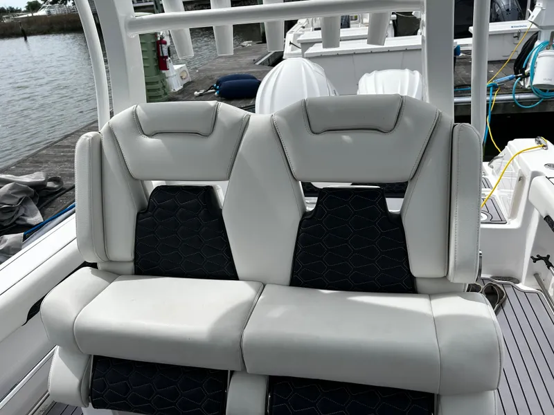 Slide: The Image of 2024 Tidewater 280 CC Adventure boat seats with sleek design and comfortable upholstery. - 25