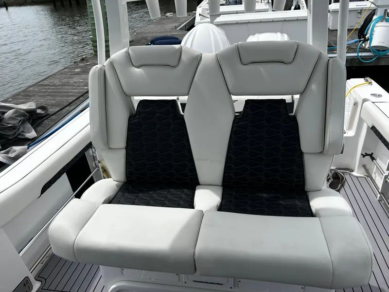 Slide: The Image of 2024 Tidewater 280 CC Adventure boat seats with sleek design and comfortable upholstery. - 26