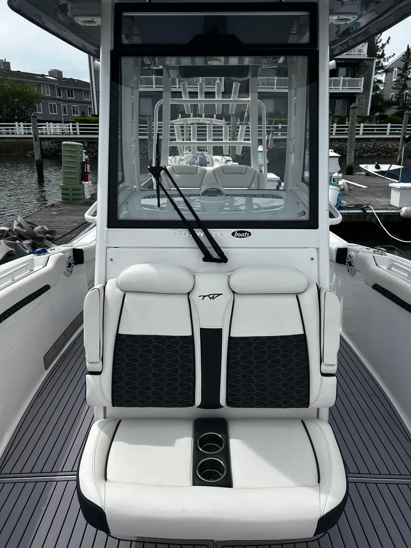 Slide: The Image of 2024 Tidewater 280 CC Adventure boat with sleek seating and modern design. - 27