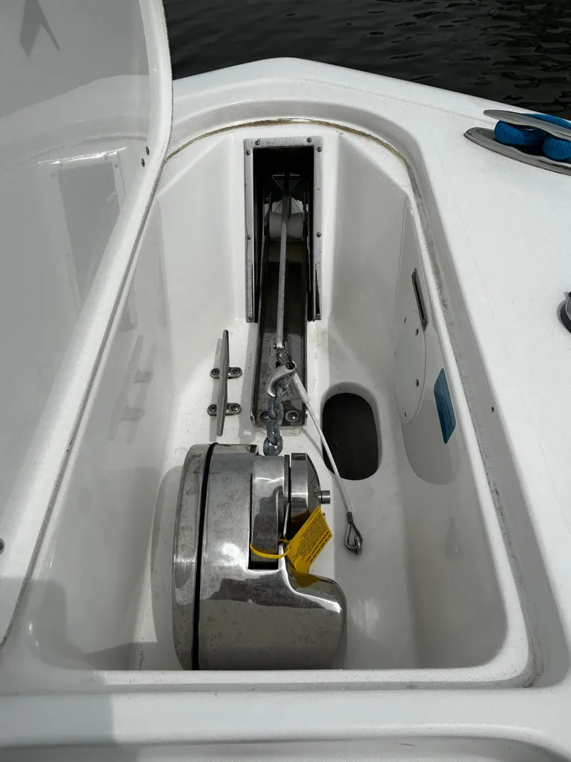 Slide: The Image of 2024 Tidewater 280 CC Adventure anchor compartment with stainless steel hardware. - 35