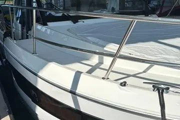 Slide: The Image of 2025 Beneteau Antares 11 Fly yacht, sleek design with stainless steel railings. - 3