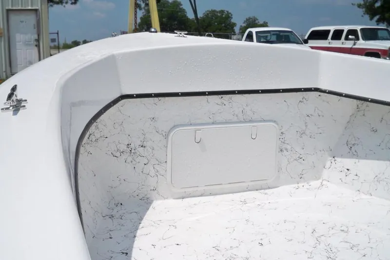 Slide: The Image of 2026 C-Hawk 200 Center Console boat interior with seating and steering wheel. - 3