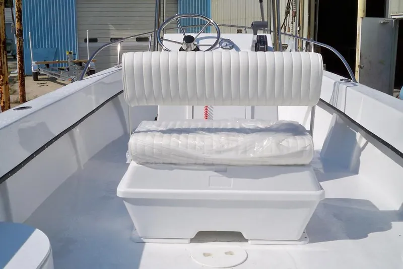 Slide: The Image of 2026 C-Hawk 200 Center Console boat on trailer, side view. - 6