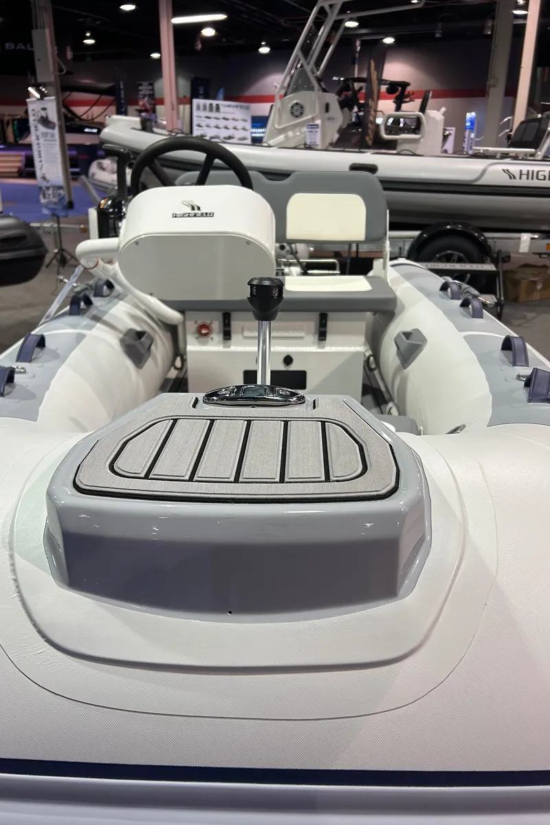 Slide: The Image of 2025 Highfield Classic 310 FCT inflatable boat interior at a boat show. - 12