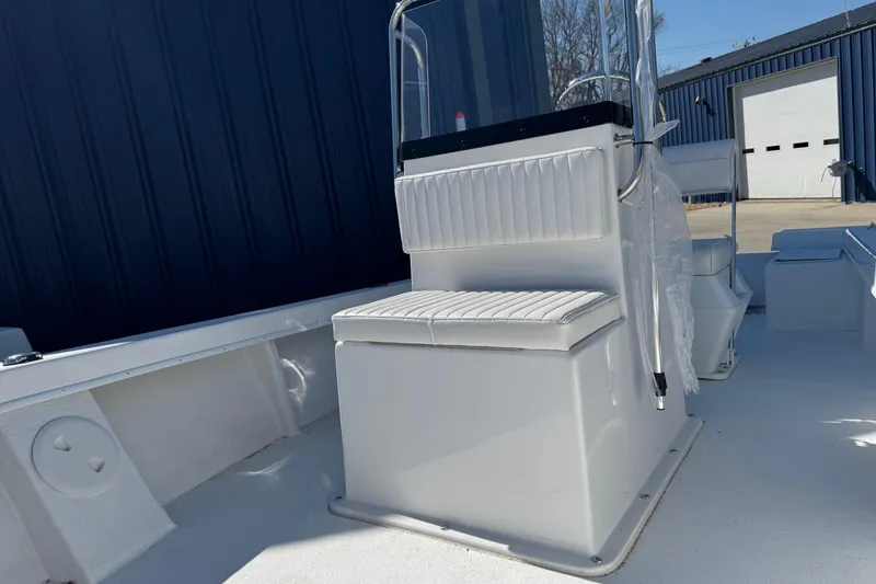 Slide: The Image of 2026 C-Hawk 18 Center Console boat interior with white seating and console. - 12