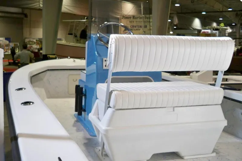 Slide: The Image of 2026 C-Hawk 18 Center Console boat on trailer, parked outdoors. - 5