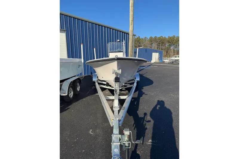 Slide: The Image of 2026 C-Hawk 18 Center Console boat on trailer, parked outdoors. - 7