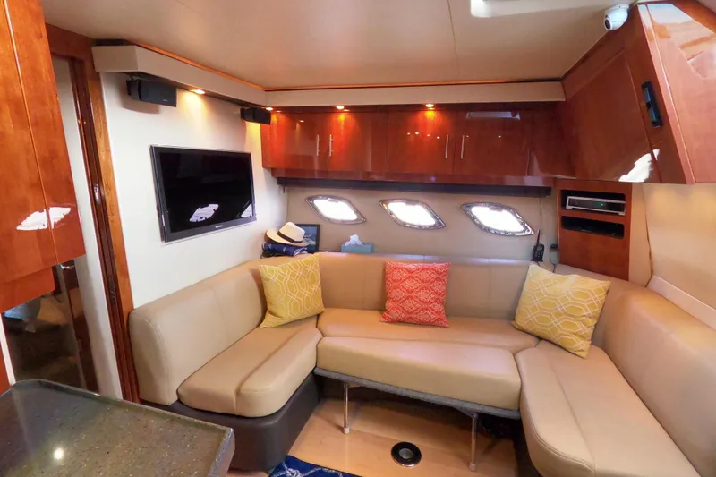 Slide: The Image of Luxurious interior of 2011 Regal 42 Sport Coupe with cozy seating and modern decor. - 8