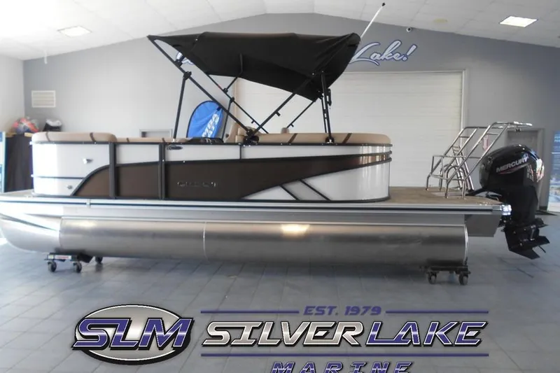 The Image of 2025 Crest Classic LX 200 SLC pontoon boat displayed at Silver Lake Marine showroom. - 1