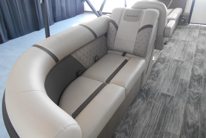 Slide: The Image of Luxurious seating in 2025 Crest Classic LX 200 SLC pontoon boat interior. - 11