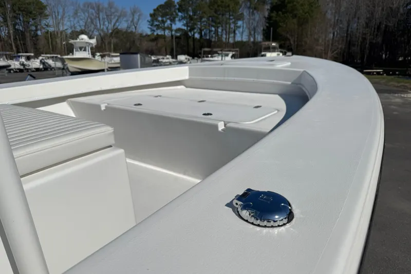 Slide: The Image of 2026 C-Hawk 23 Center Console boat interior with seating and storage compartments. - 14