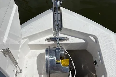 Slide: The Image of 2022 Edgewater 230CC boat anchor system, featuring a sleek, modern design. - 10