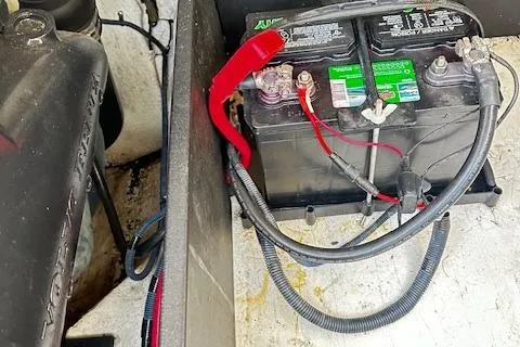 Slide: The Image of Battery compartment of 2016 Regal 2800 Bowrider boat with visible wiring. - 26