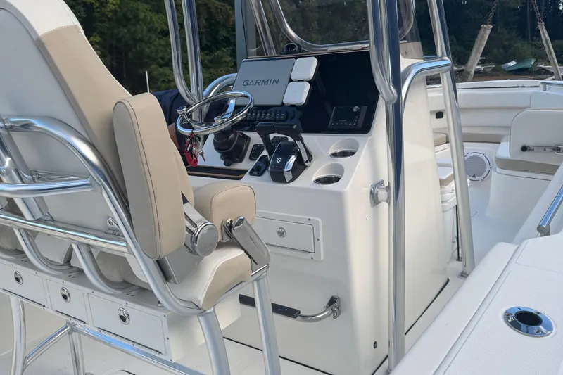 Slide: The Image of Interior view of 2026 Bulls Bay 255 boat with steering console and seating. - 10