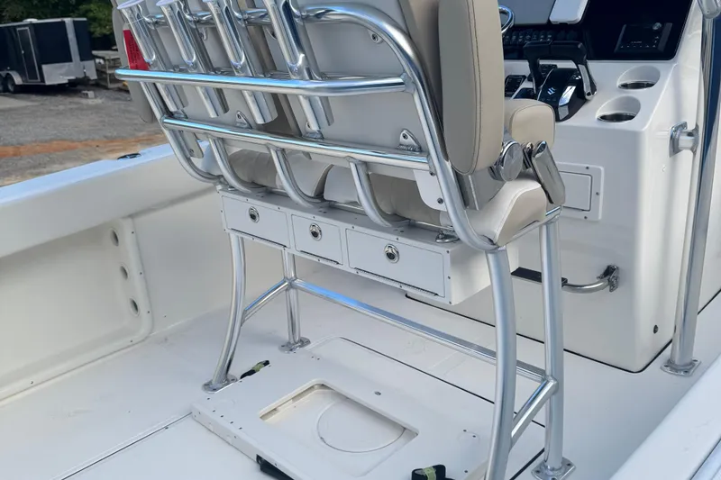 Slide: The Image of 2026 Bulls Bay 255 boat interior with seating and control panel. - 9