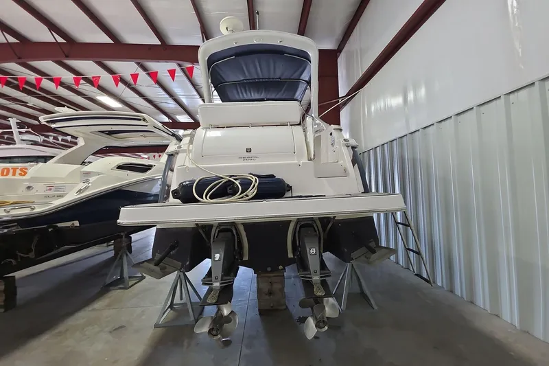 Slide: The Image of 2007 Regal 2860 Window Express boat in indoor storage, rear view. - 2
